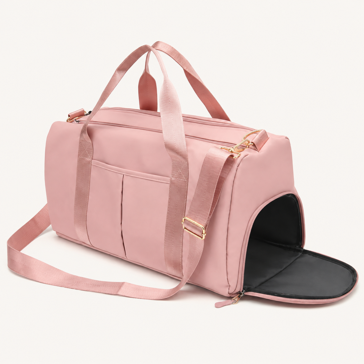 Pink Split Duffel Bag with the side access compartment open on a warm off-white studio background.